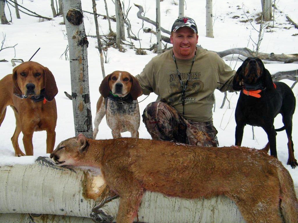 Bryan and his hounds with a well deserved trophy