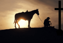 He Came Alive! cowboy-kneeling-at-cross-clip-art.png