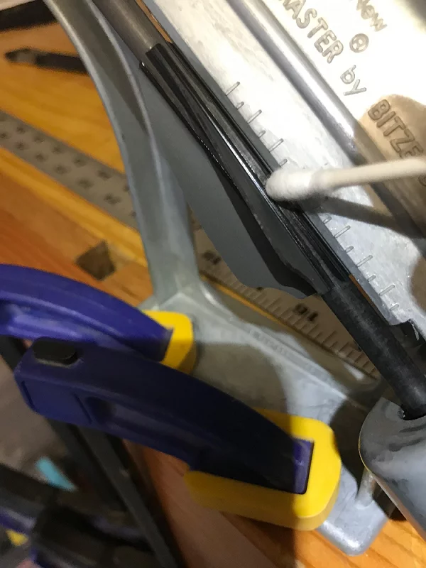 Clean excess glue with a Q-tip