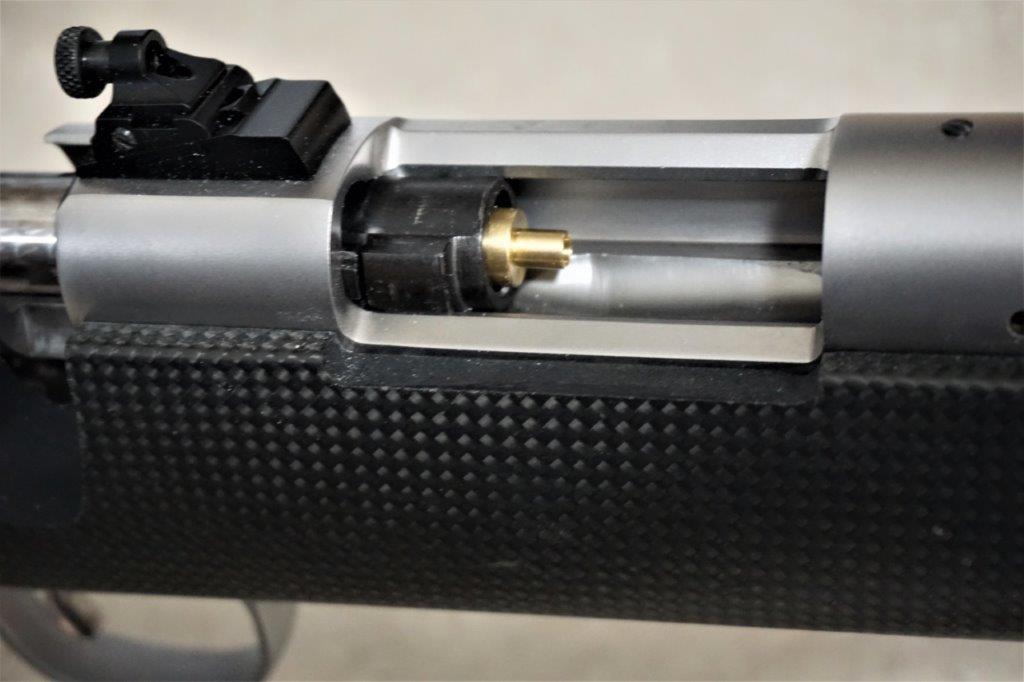 The magnetic bolt stop positioning a module for easier access in the action opening.
