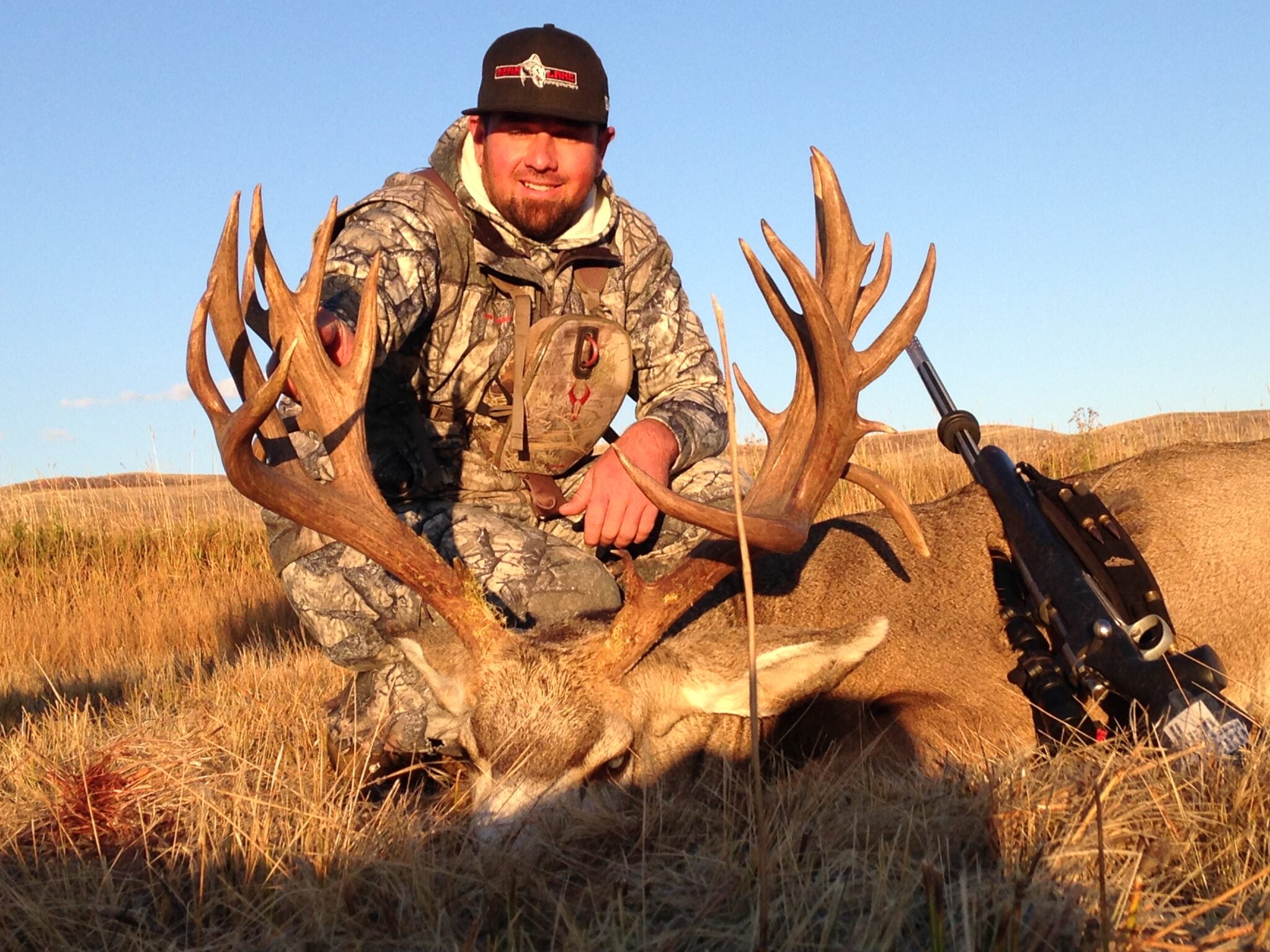 Travis Holds Big Mule Deer