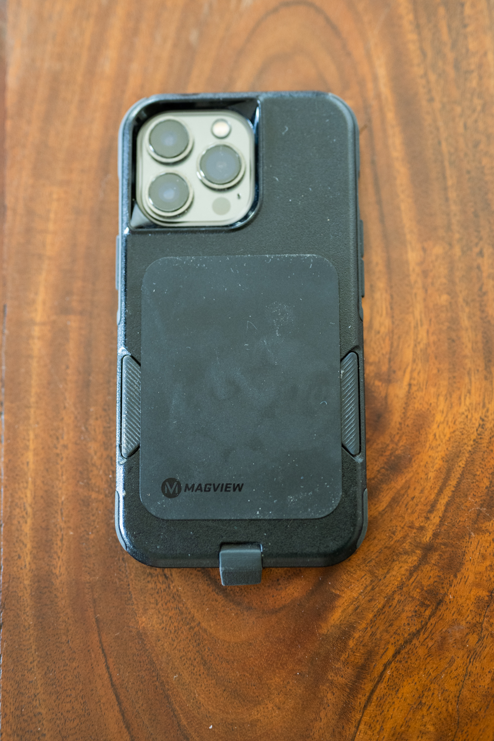 The MagView steel plate adheres well to most phone cases and keeps the magnets on the optic, not your phone.