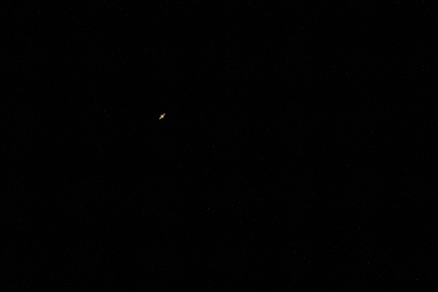 The author used the additional magnification of the 1.6x extender to view Saturn in the night sky.