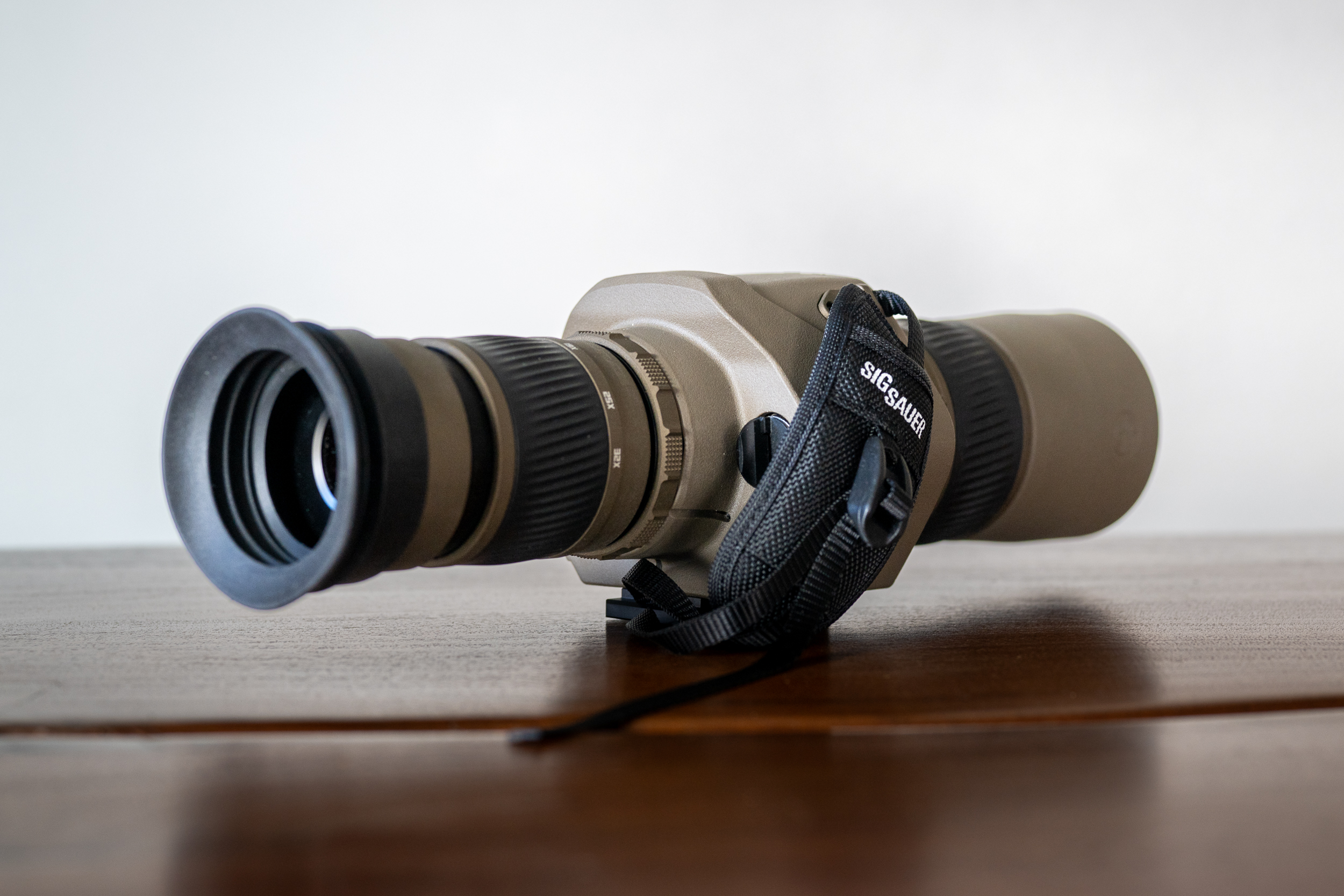 The Oscar 6 with hand strap and light-blocking eyepiece cover.